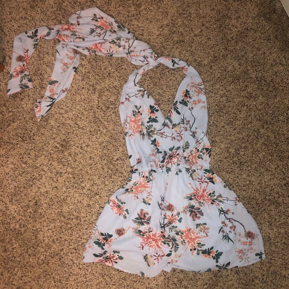 Pastel blue floral print open back halter romper
